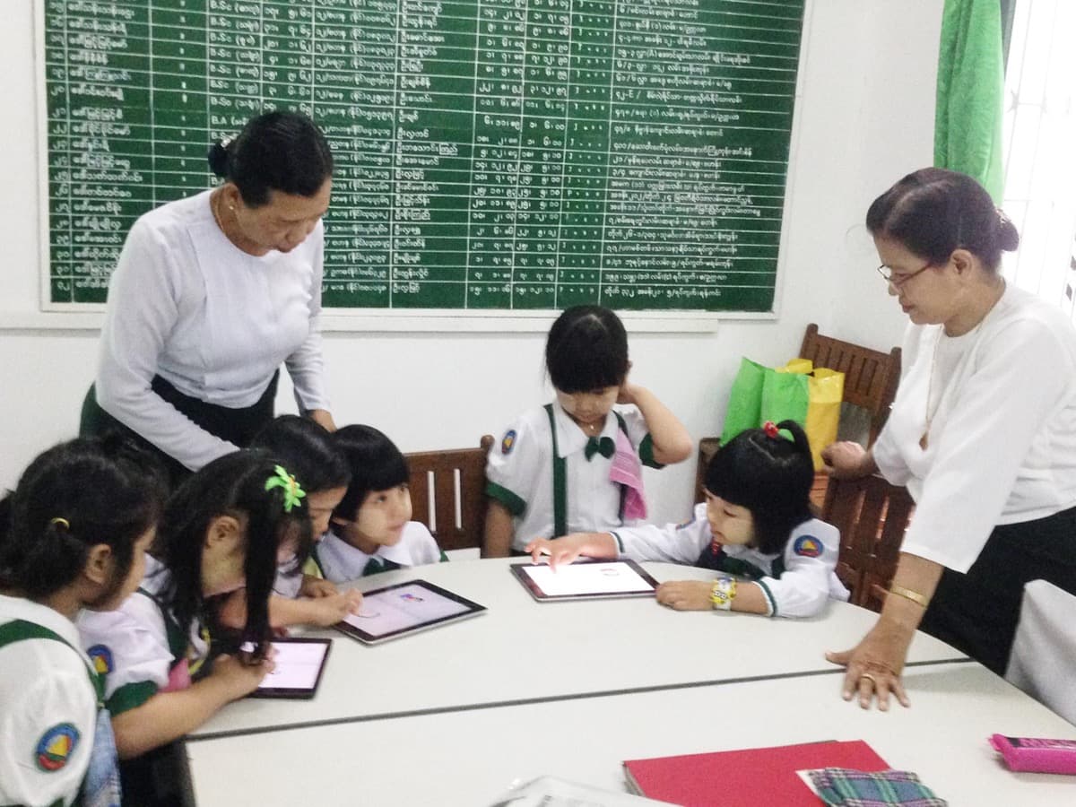 Students using Phew on iPads in a Myanmar classroom